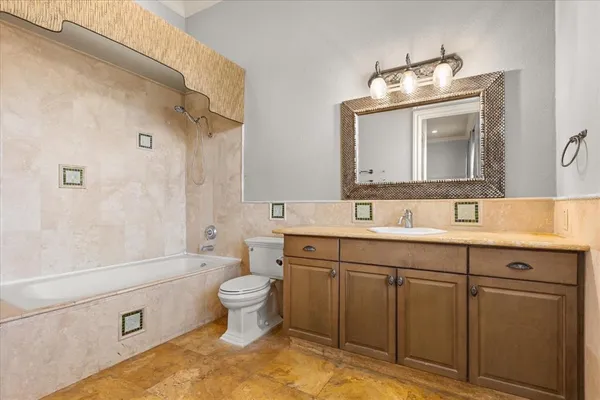 a view of a swimming pool with a yard