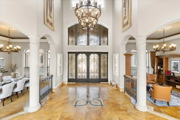 a living room with fireplace furniture and a window