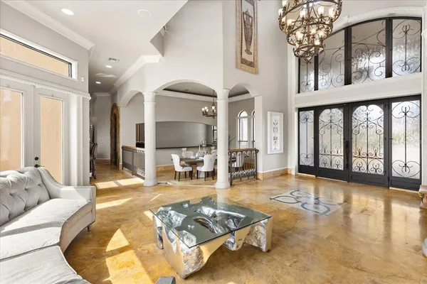 a kitchen with stainless steel appliances granite countertop a stove and cabinets