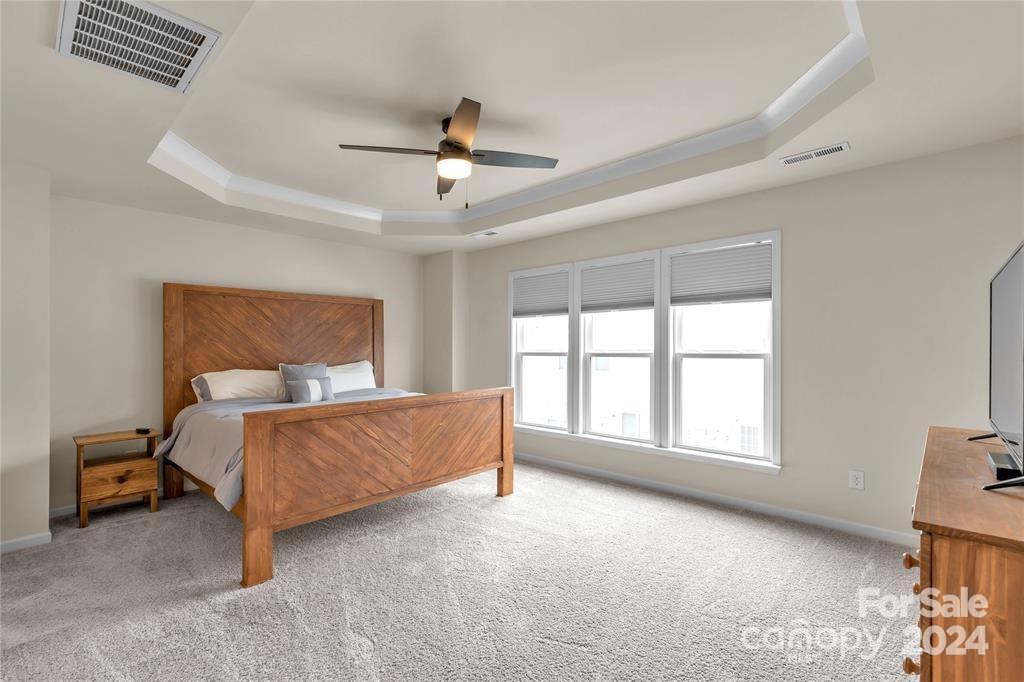 825 Canoe Song Road Fort Mill, SC 29708 - Photo 12 of 17 a bed room with a bed and a window