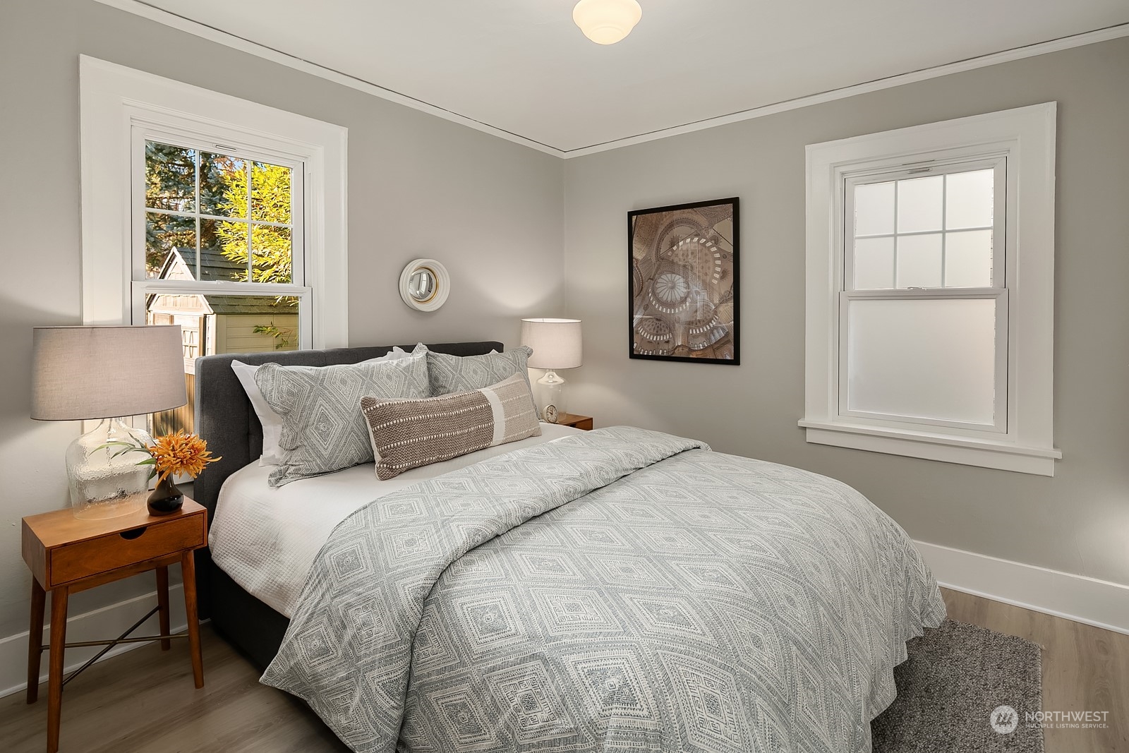 401 20th Avenue Seattle, WA 98122 - Photo 13 of 28 a bedroom with a bed and a window