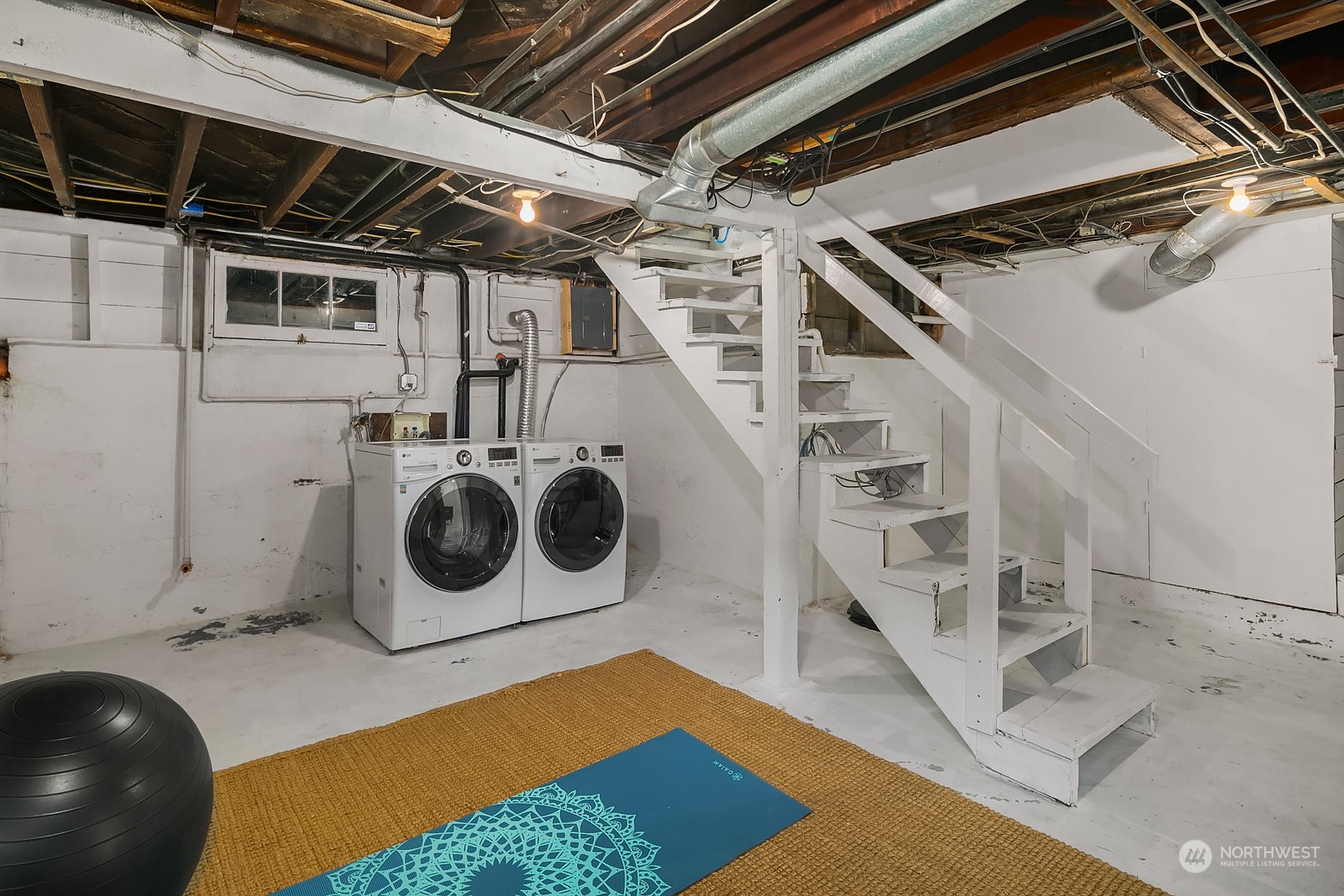 401 20th Avenue Seattle, WA 98122 - Photo 20 of 28 a utility room with dryer and washer