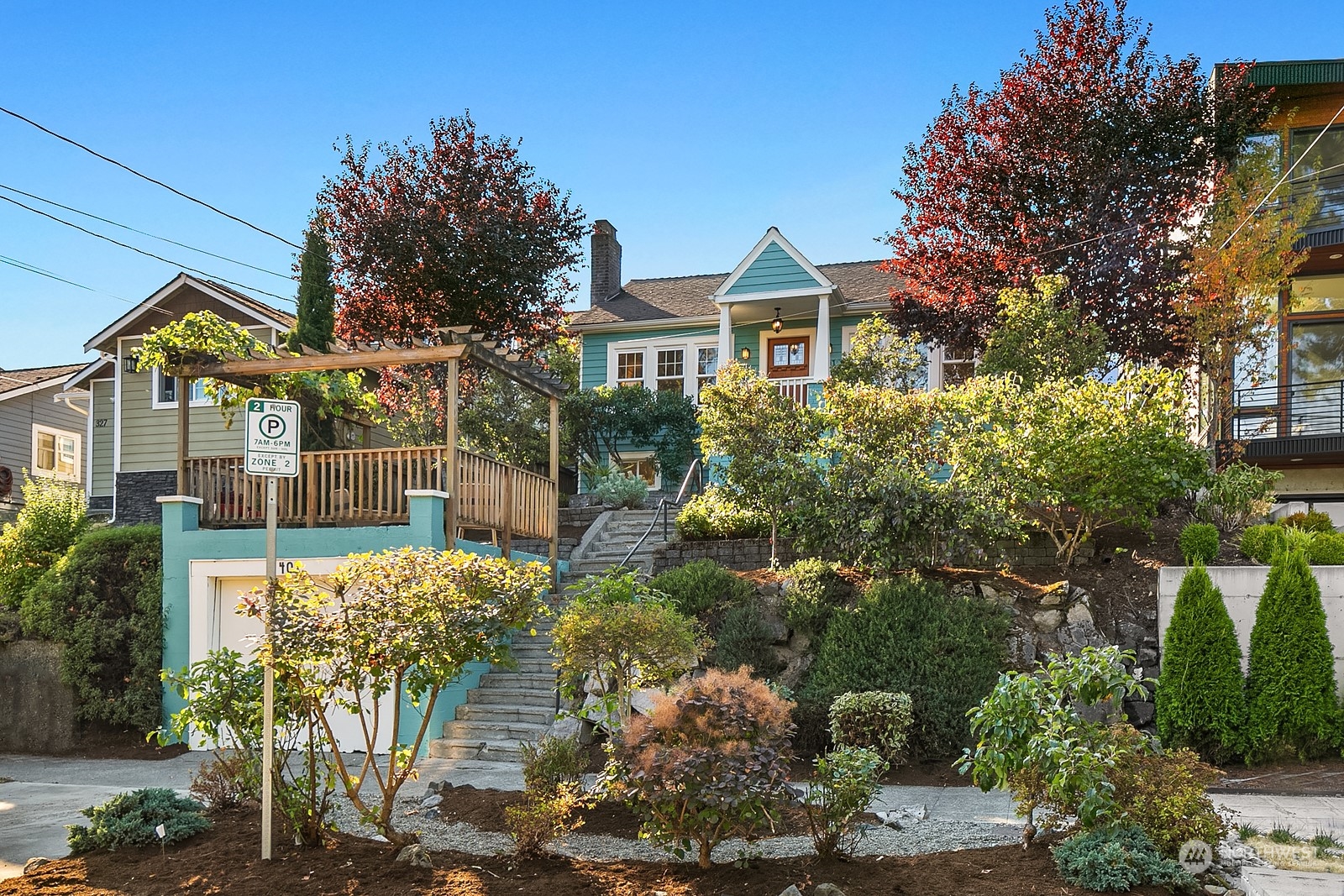 401 20th Avenue Seattle, WA 98122 - Photo 24 of 28 a front view of a house with a yard