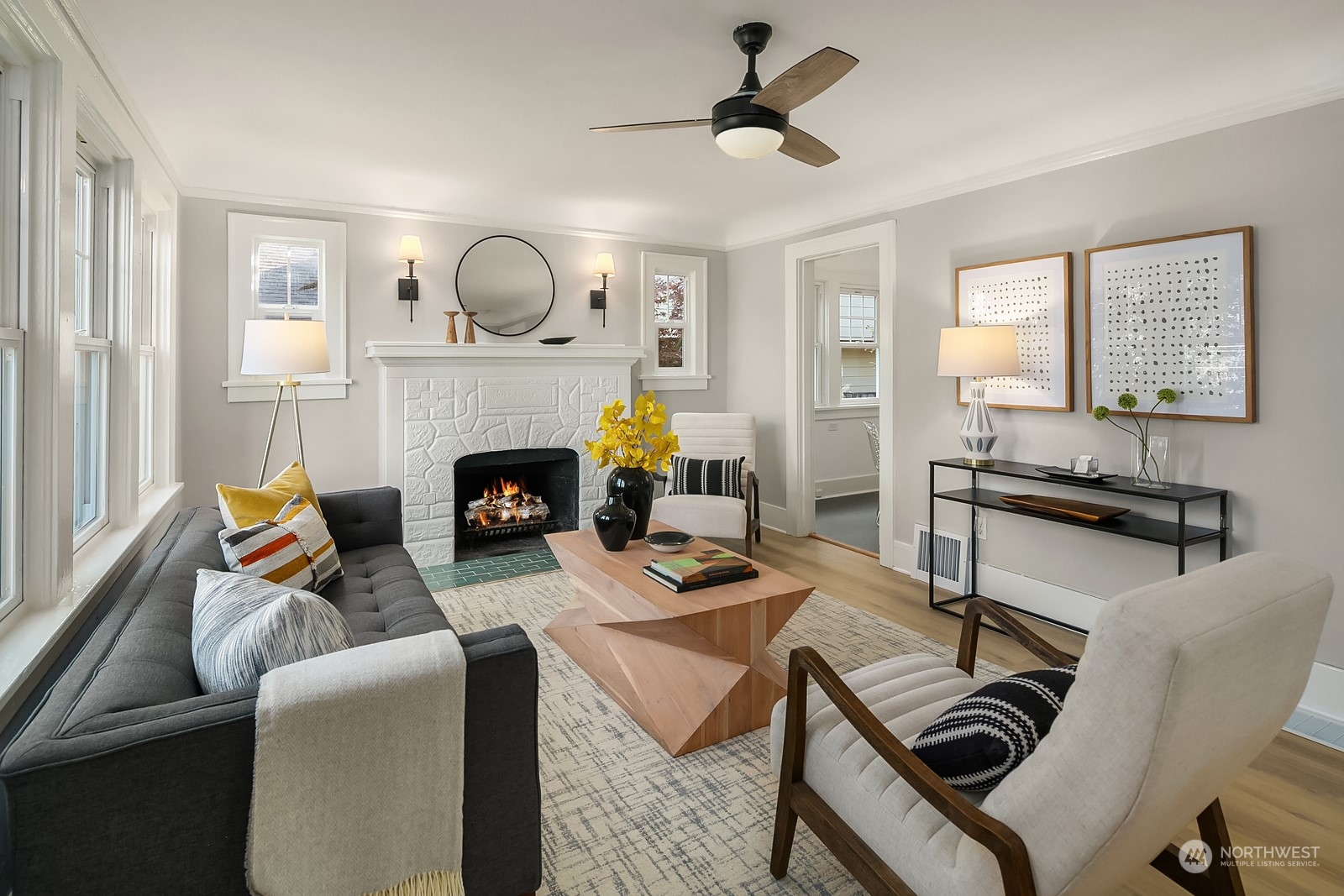 401 20th Avenue Seattle, WA 98122 - Photo 5 of 28 a living room with furniture fireplace and a window
