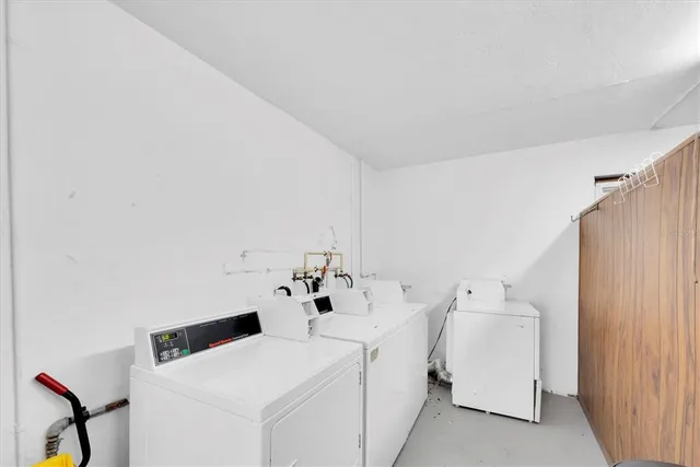 a utility room with dryer and washer