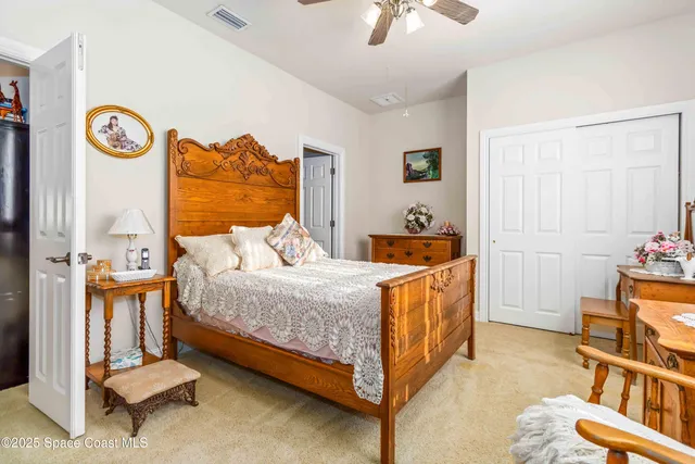 a view of a lake with outdoor seating space