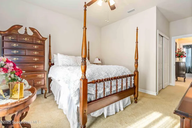 swimming pool view with a garden space