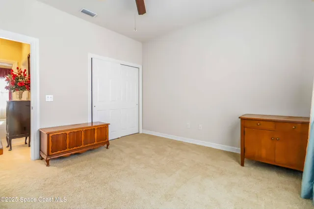 a front view of a house with yard porch and furniture