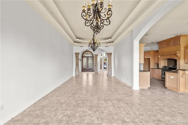 a kitchen with stainless steel appliances granite countertop a sink and cabinets