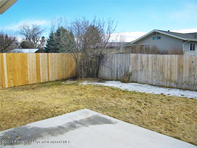 749 Cactus Court Rifle, CO 81650 - Photo 12 of 12 a view of a backyard of the house