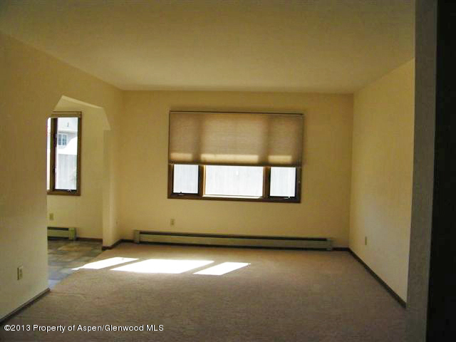 749 Cactus Court Rifle, CO 81650 - Photo 4 of 12 an empty room with a window