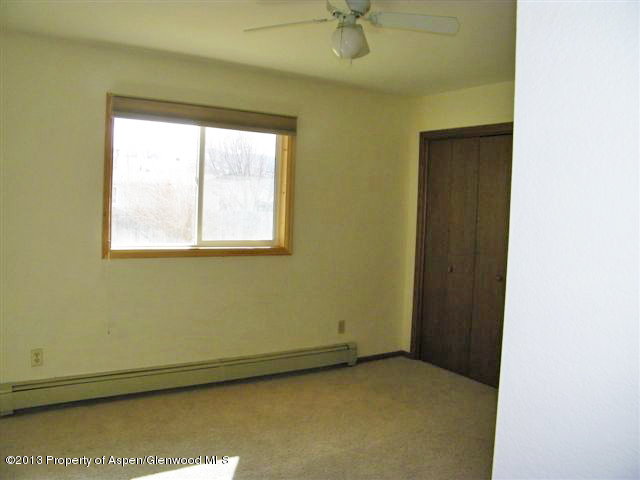 749 Cactus Court Rifle, CO 81650 - Photo 7 of 12 an empty room with a window