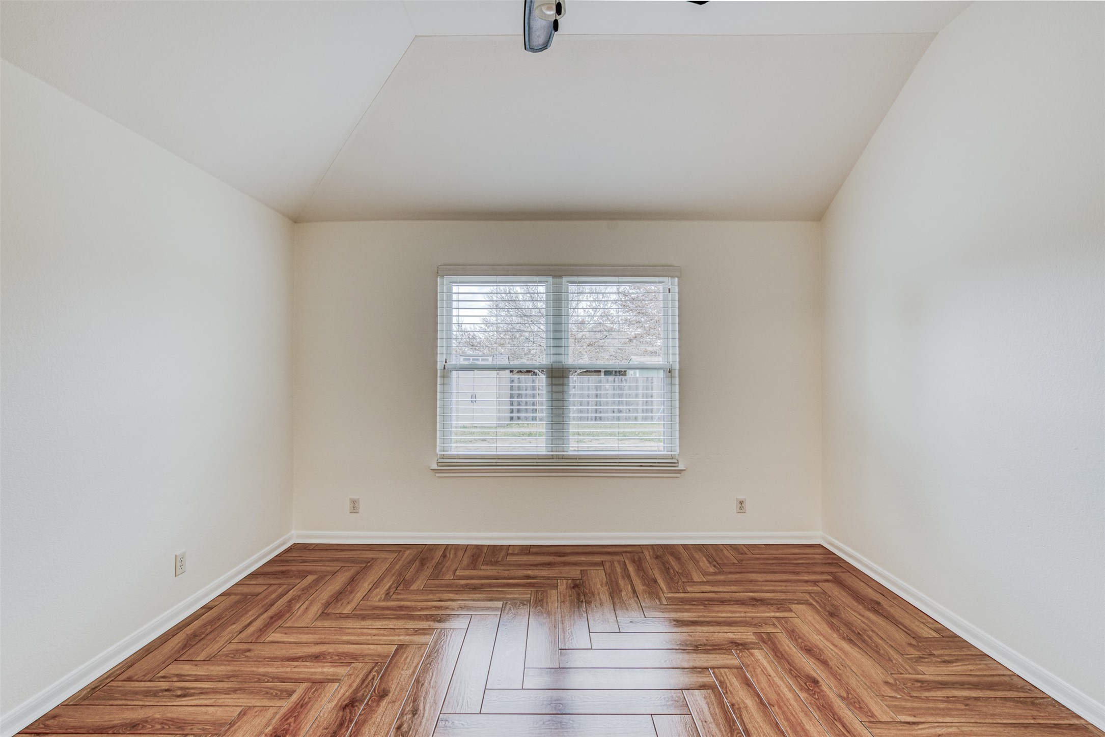 102 Chandler View Trail Round Rock, TX 78665 - Photo 20 of 26 a view of a room with wooden floor and window