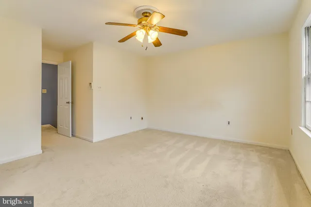 a view of a big room with carpet
