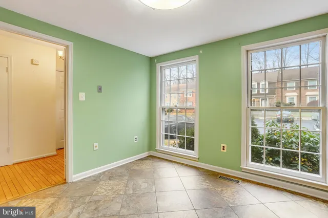 a view of a room with windows