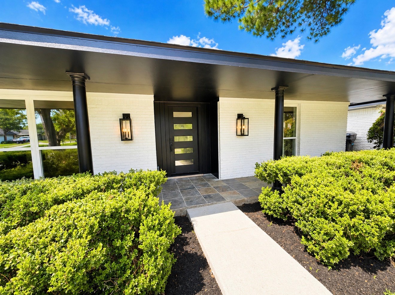 5642 Warm Springs Road Houston, TX 77035 - Photo 4 of 19 Beautiful updated entry with covered porch and modern finishes