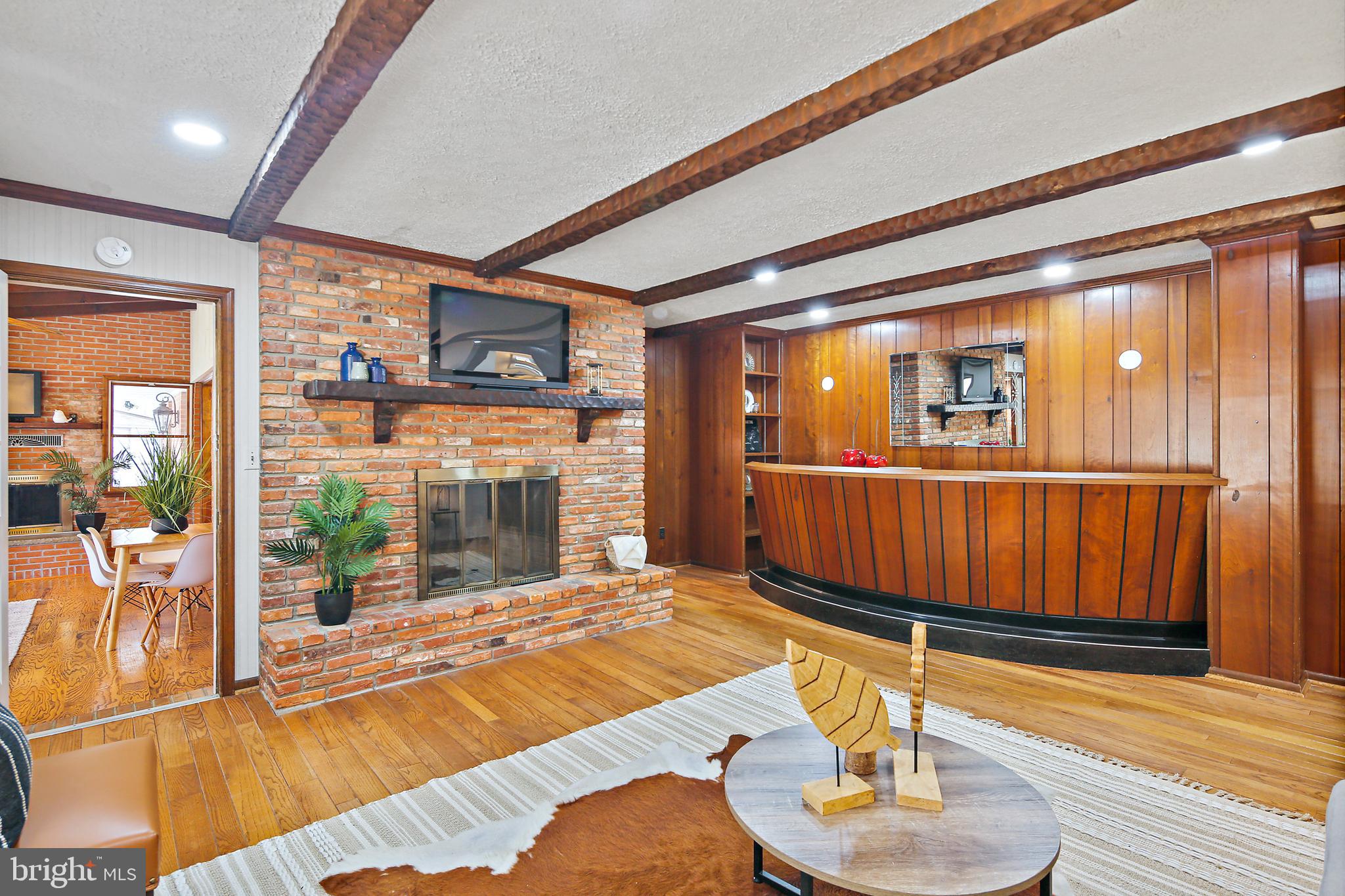 13414 Bladon Road Phoenix, MD 21131 - Photo 15 of 41 Hardwood Floor, Exposed Beams & Built In Wet Bar