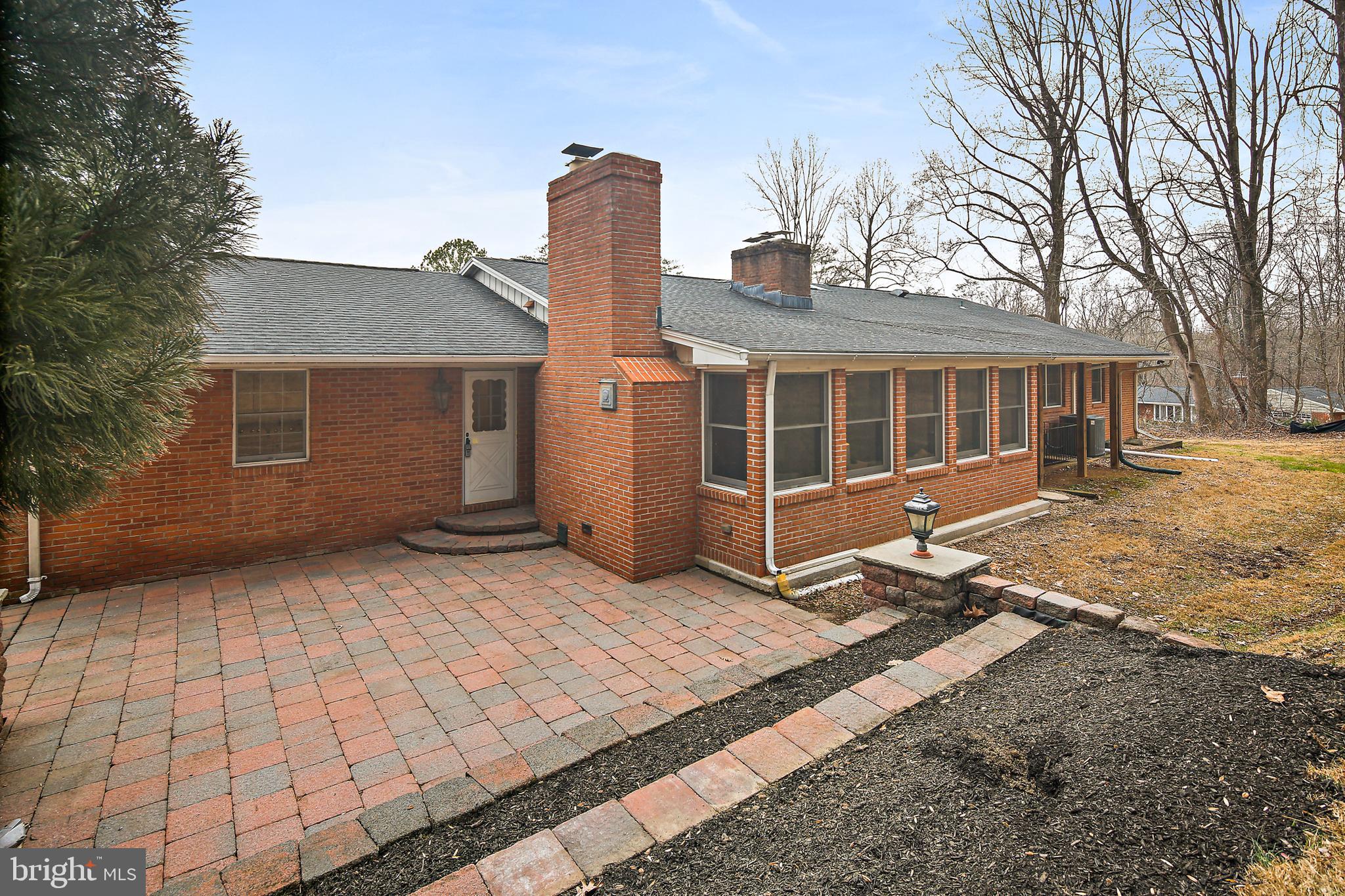 13414 Bladon Road Phoenix, MD 21131 - Photo 34 of 41 Paver Patio & Paver Retaining Walls / Bench