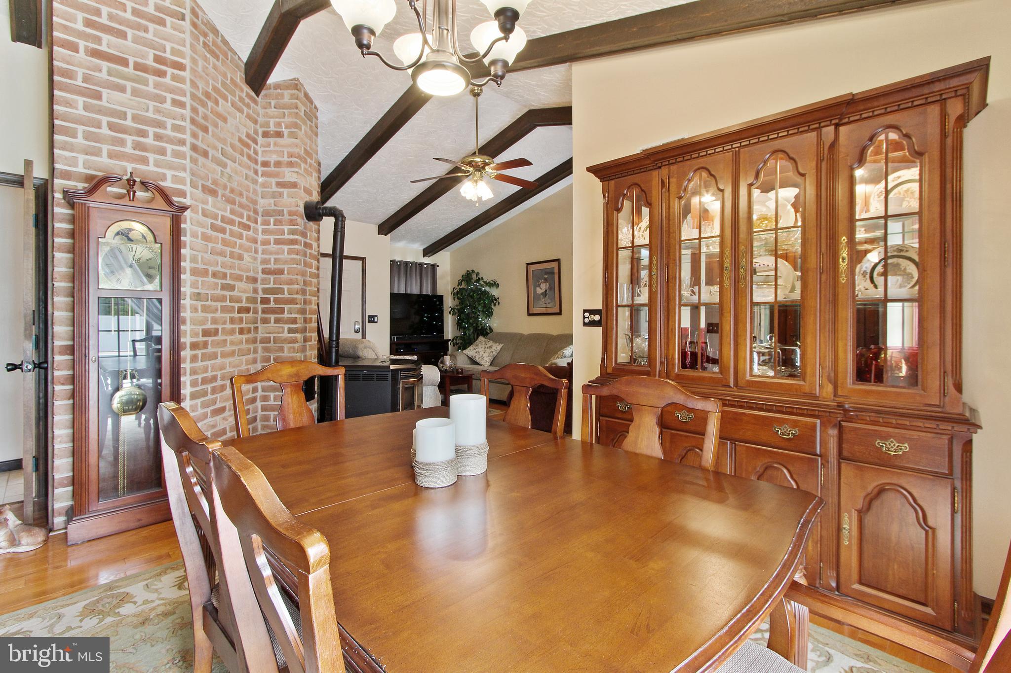 830 Horn Road Red Lion, PA 17356 - Photo 10 of 44 exposed brick add character to the dining area