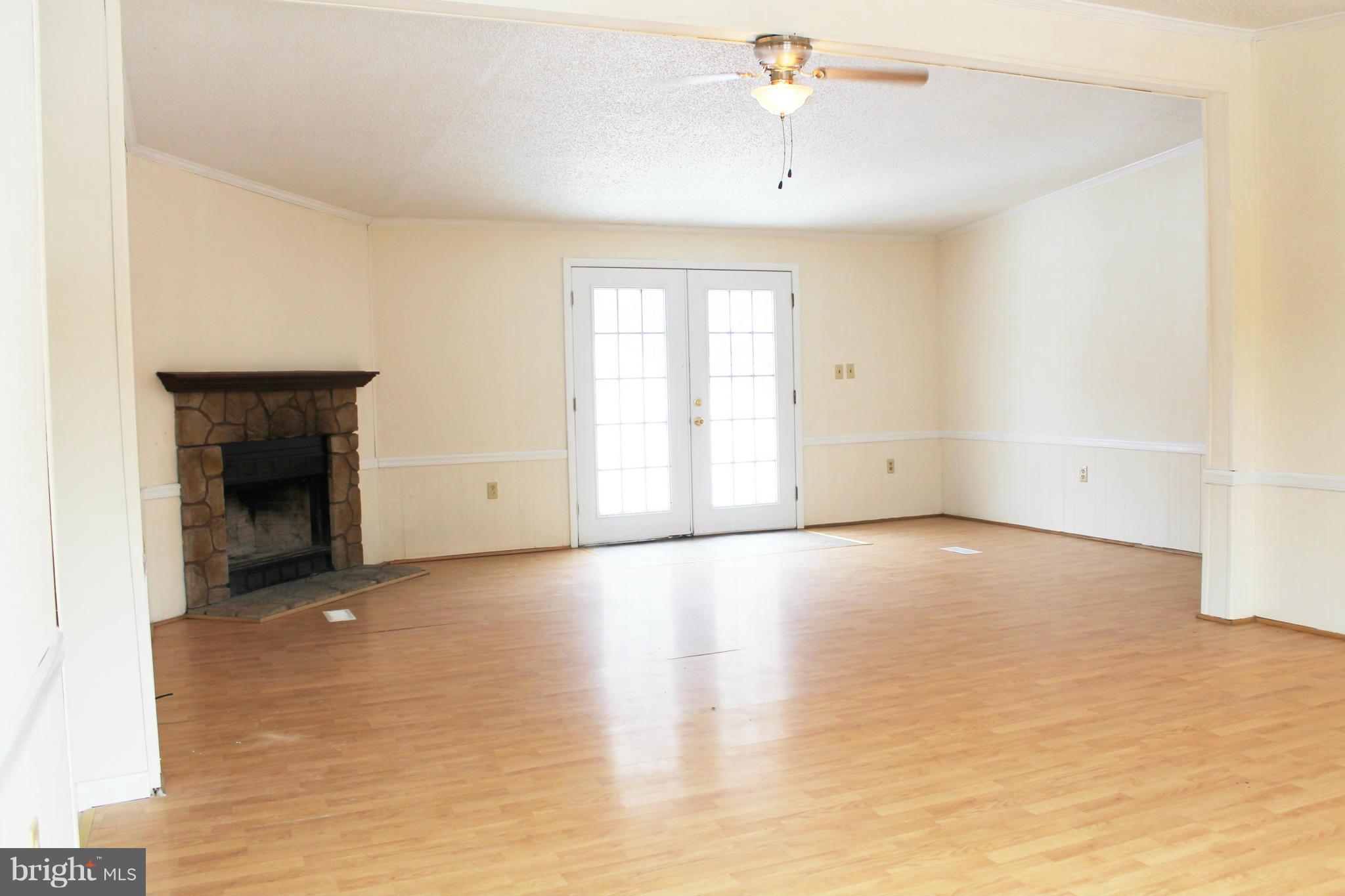 5703 Hines Road Frederick, MD 21704 - Photo 5 of 27 Living Room with Fireplace