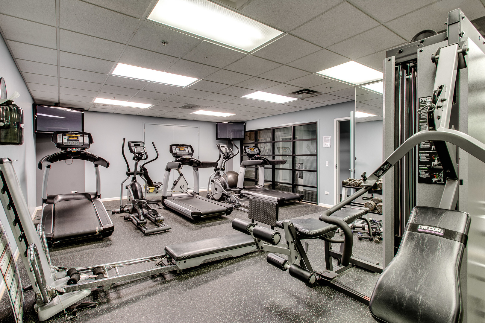 1200 West Monroe Street, Unit 805 Chicago, IL 60607 - Photo 16 of 18 a view of a room with gym equipment