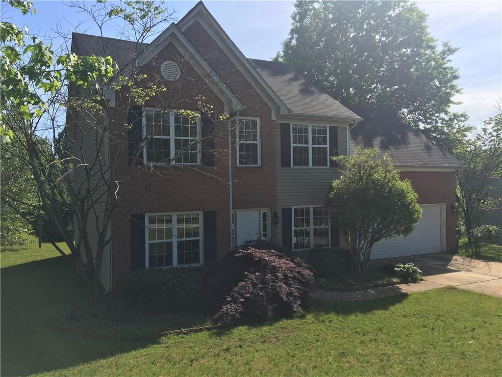 3711 Rainshower Lane Decatur, GA 30034 - Photo 1 of 1 front view of a house with a yard
