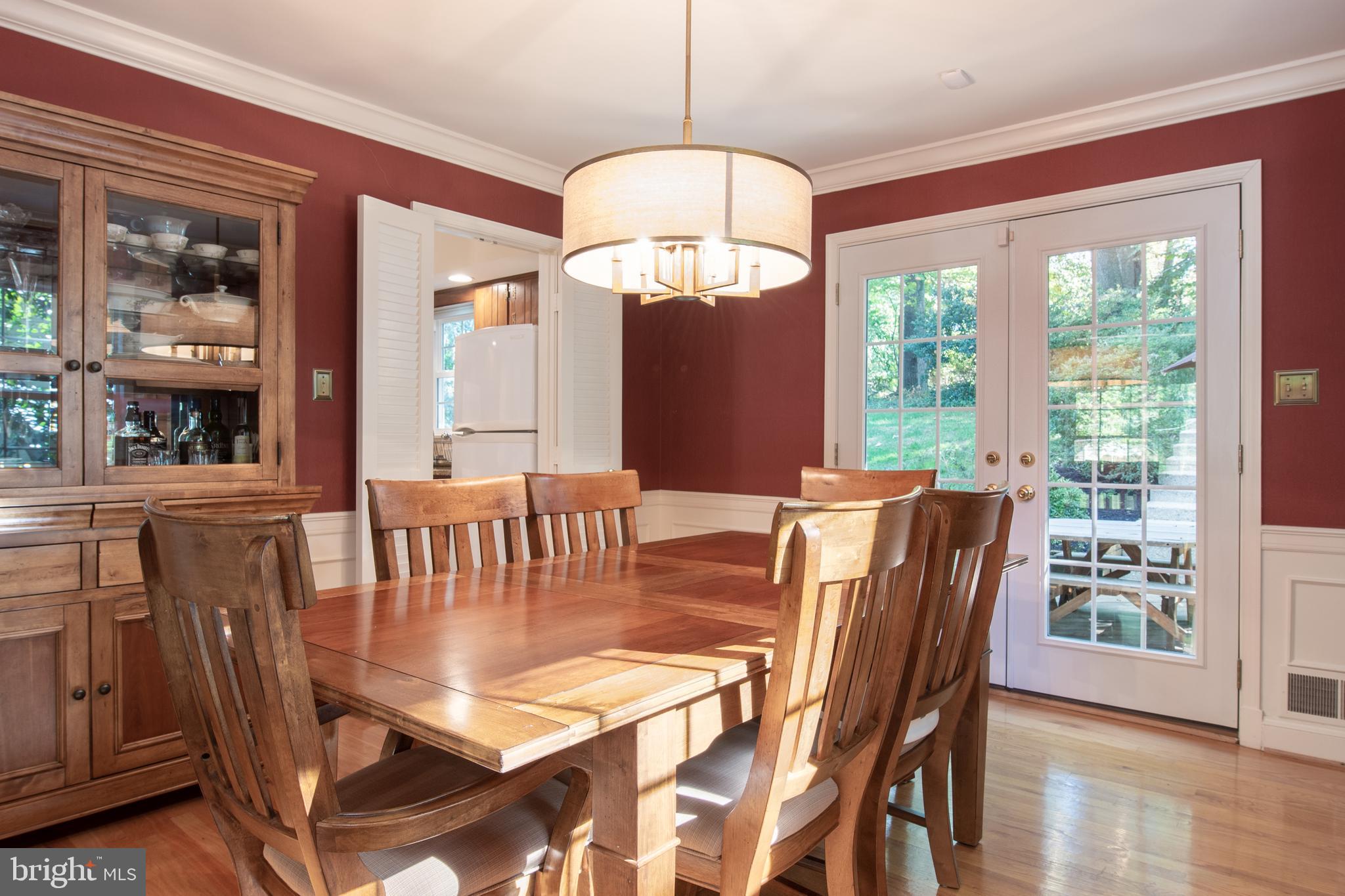 7119 Devonshire Road Alexandria, VA 22307 - Photo 11 of 37 Dining room with doors leading to patios and decks