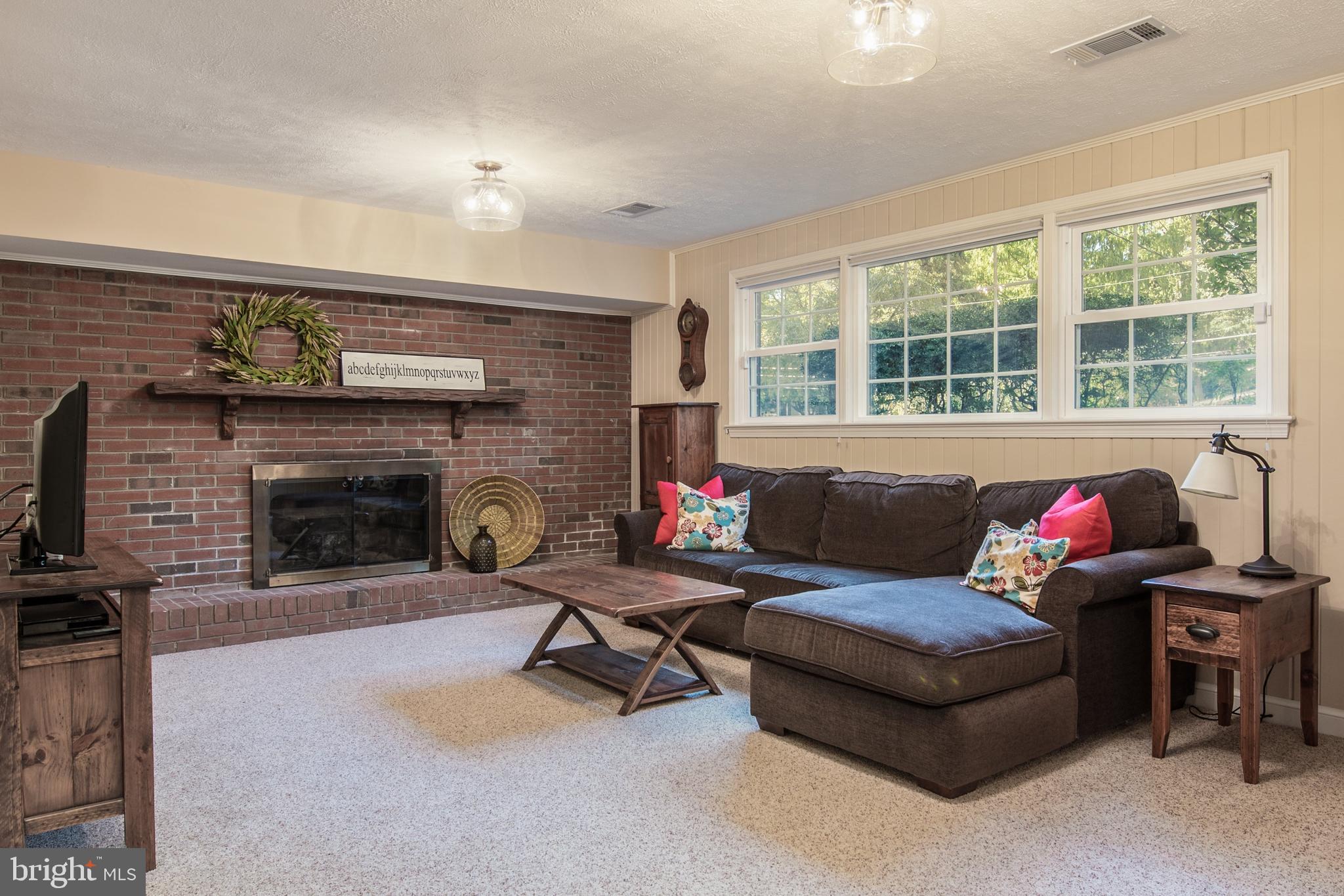 7119 Devonshire Road Alexandria, VA 22307 - Photo 26 of 37 Family room with Wood-burning fireplace