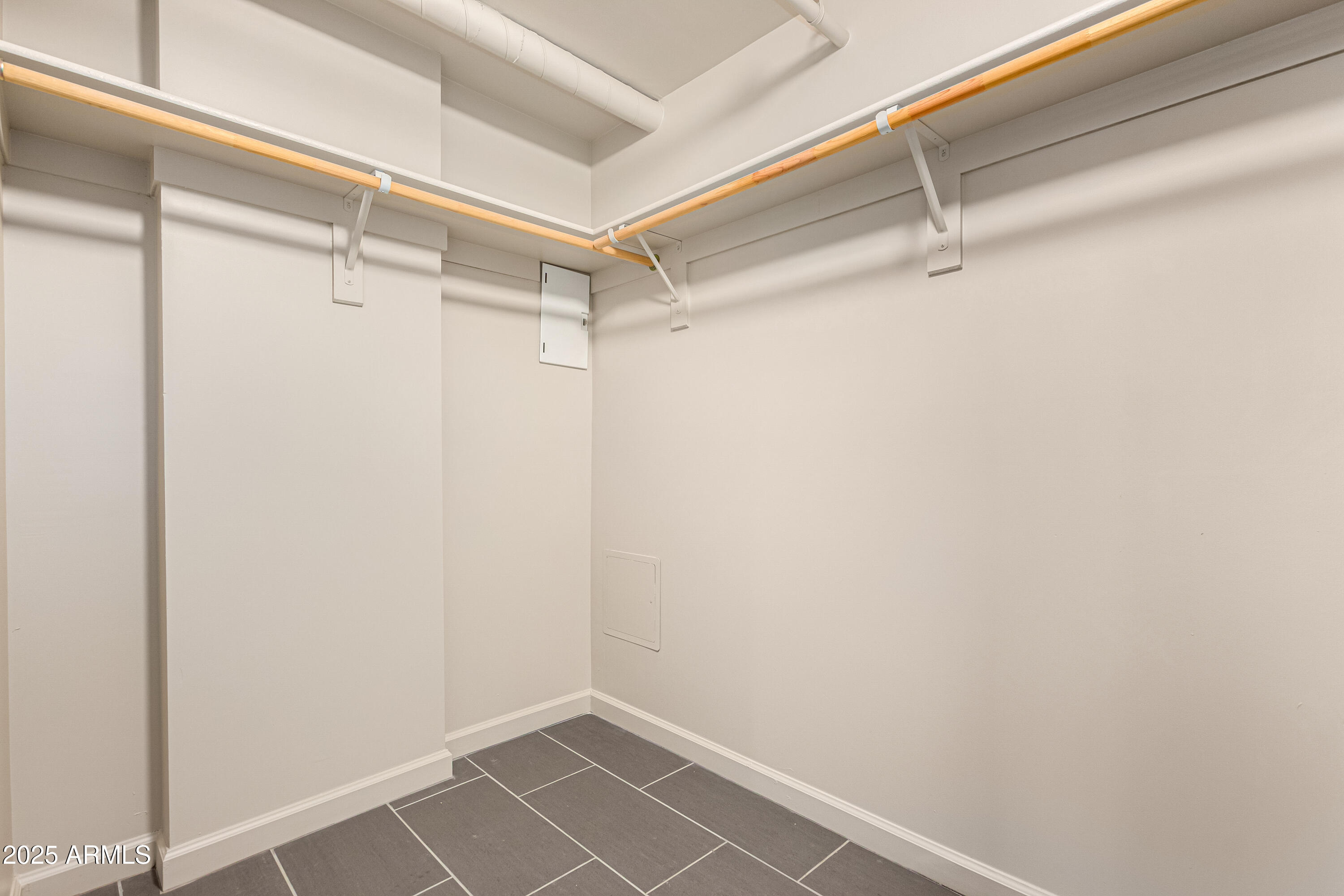 535 West Thomas Road, Unit 405 Phoenix, AZ 85013 - Photo 15 of 28 Primary Walk-in Closet