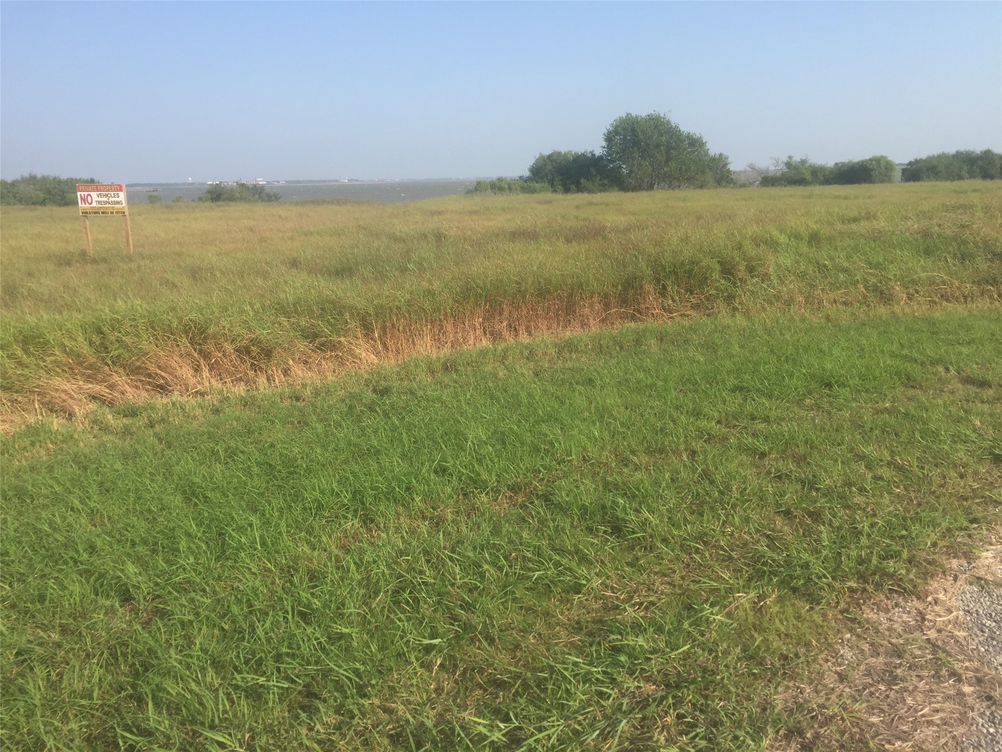 3 Redfish Lane Port Lavaca, TX 77979 - Photo 3 of 11 a view of an ocean from a yard