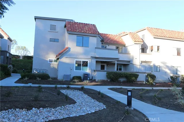 a front view of a house with entertaining space
