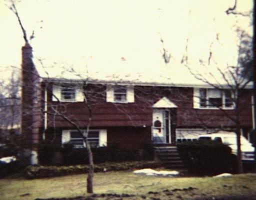 561 Old Mill Road Fairfield, CT 06824 - Photo 1 of 1 a front view of a house with street view