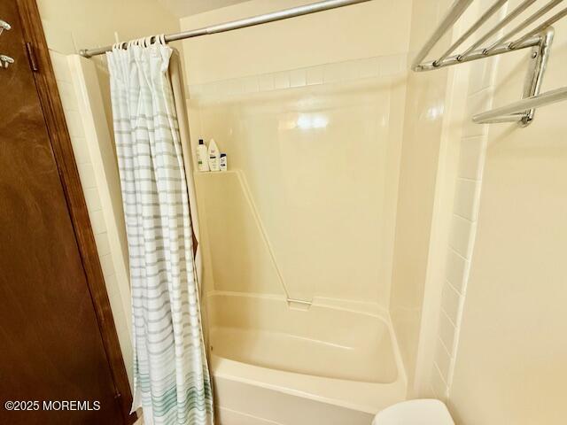 210 Sumner Avenue, Unit 5 Seaside Heights, NJ 08751 - Photo 11 of 20 a bathroom with a shower and a toilet