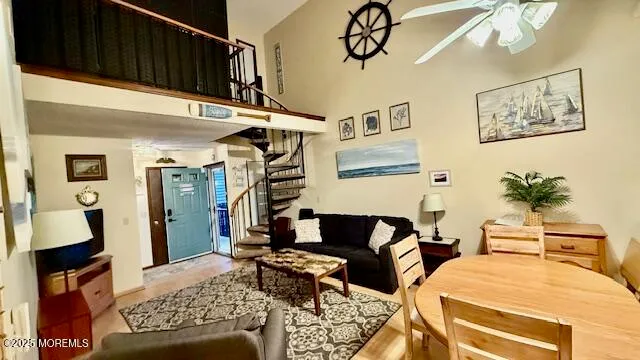 a view of living room with furniture and wooden floor