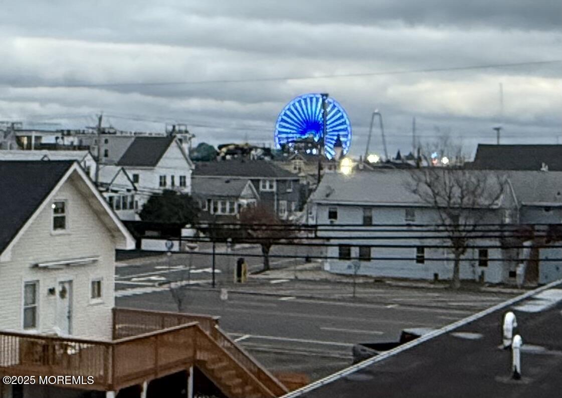 210 Sumner Avenue, Unit 5 Seaside Heights, NJ 08751 - Photo 19 of 20 a view of a house with a terrace