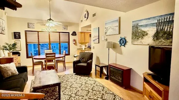 a bathroom with a sink a mirror and a window