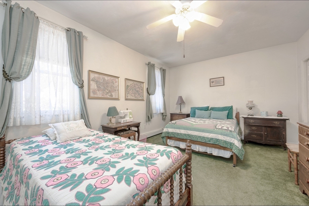 130 Scadding Street Taunton, MA 02780 - Photo 22 of 42 a bedroom with bed and a window