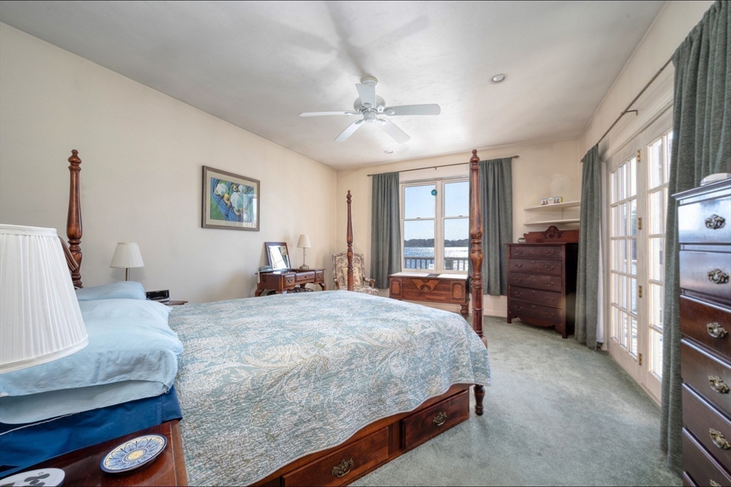 130 Scadding Street Taunton, MA 02780 - Photo 24 of 42 a bedroom with a large bed and a window