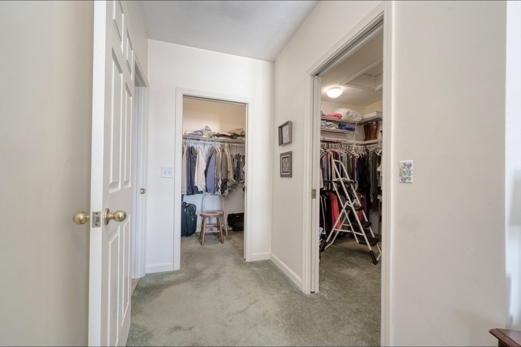 130 Scadding Street Taunton, MA 02780 - Photo 26 of 42 a view of a hallway with closet and a window