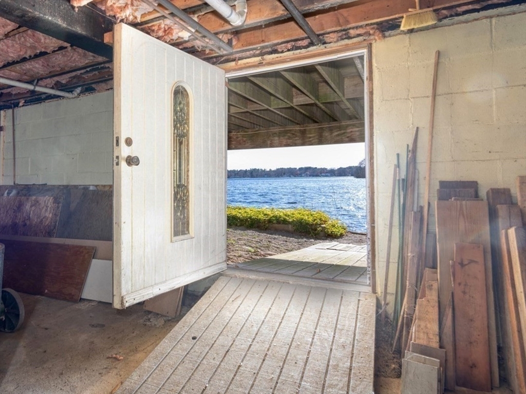 130 Scadding Street Taunton, MA 02780 - Photo 39 of 42 a view of a door and wooden floor in front of a house