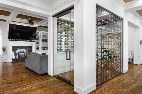 a living room with furniture fireplace and flat screen tv