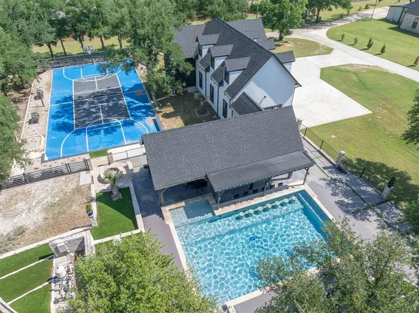 an aerial view of a house having yard