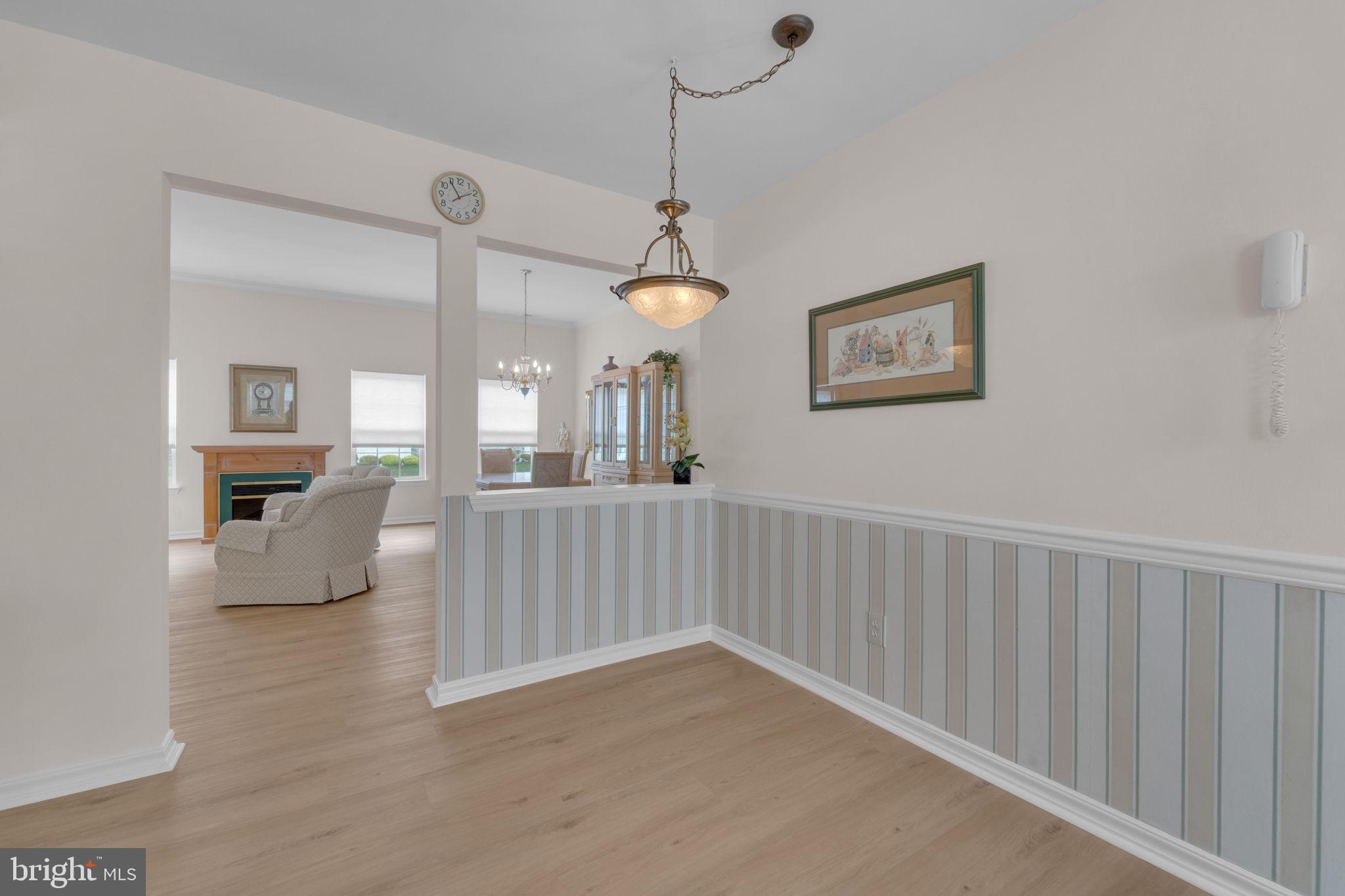 801 Freeport Way Williamstown, NJ 08094 - Photo 13 of 29 a view of a livingroom with furniture and hardwood floor