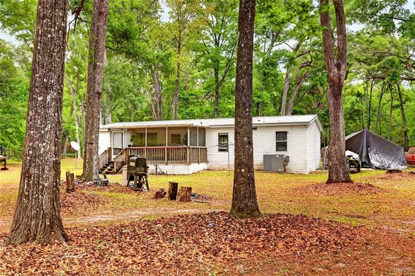 a front view of a house with a patio