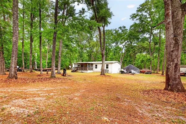 a view of a outdoor space and basketball court