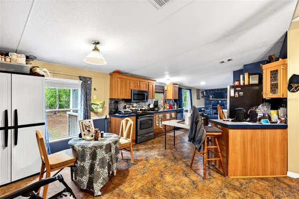 a view of a dining room with furniture