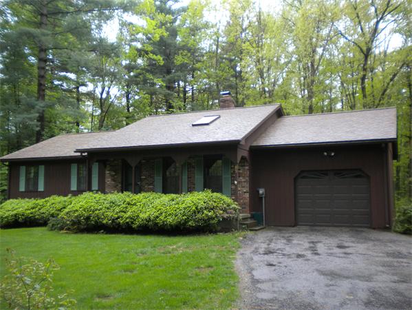 85 North Plain Road Sunderland, MA 01375 - Photo 3 of 13 a front view of a house with garden