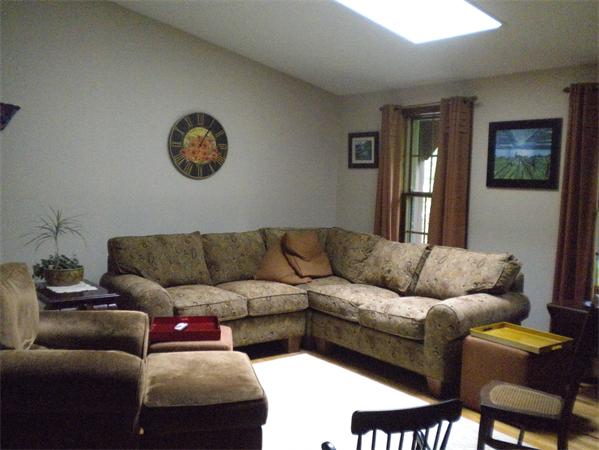 85 North Plain Road Sunderland, MA 01375 - Photo 6 of 13 a living room with furniture and a window