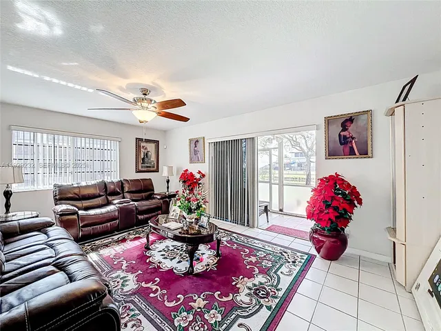 a living room with furniture or couch and a window