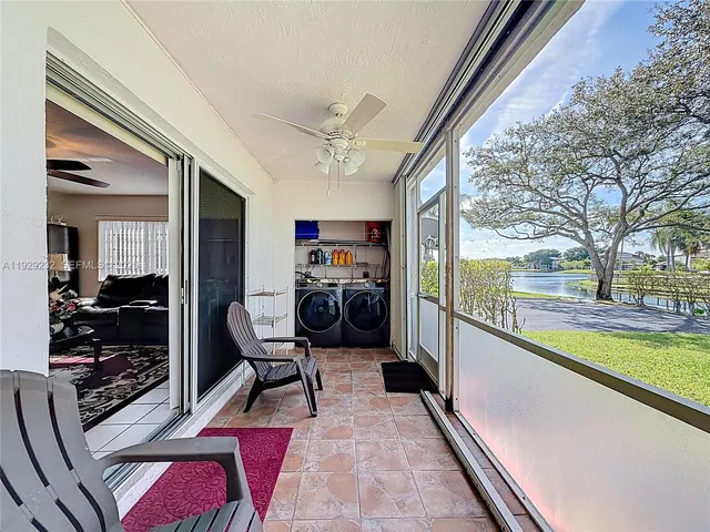 a view of a living room and dining room